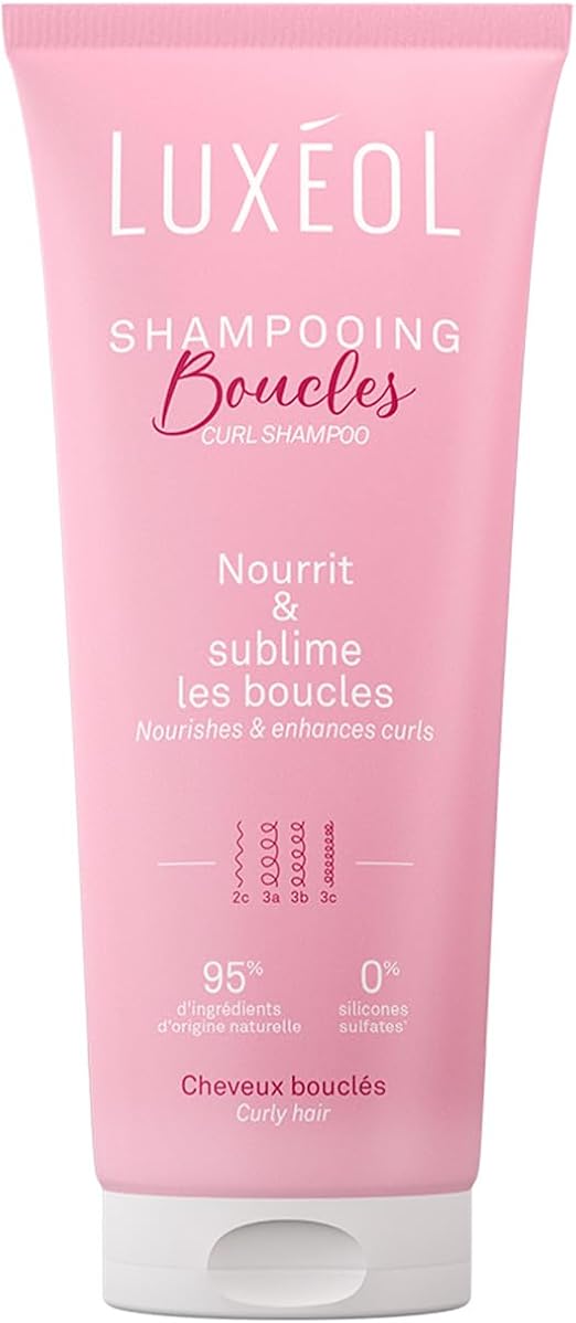 Tube rose du shampooing Boucles Luxéol