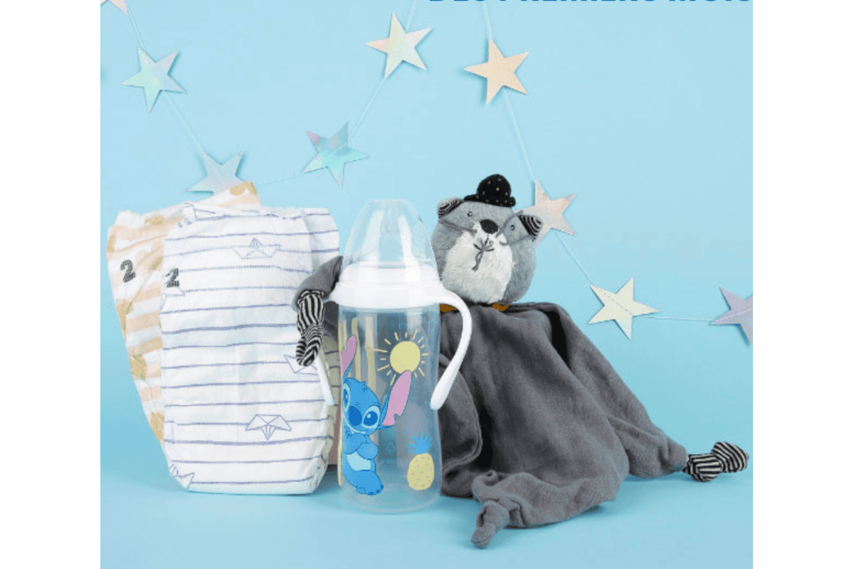Couches Pampers taille 2 biberon Stitch et doudou loutre