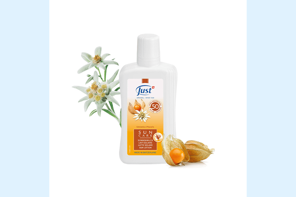 Test gratuit Just France Lait Solaire IP 50 SUN CARE crème solaire haute protection UVA UVB famille tube blanc orange fond ciel
