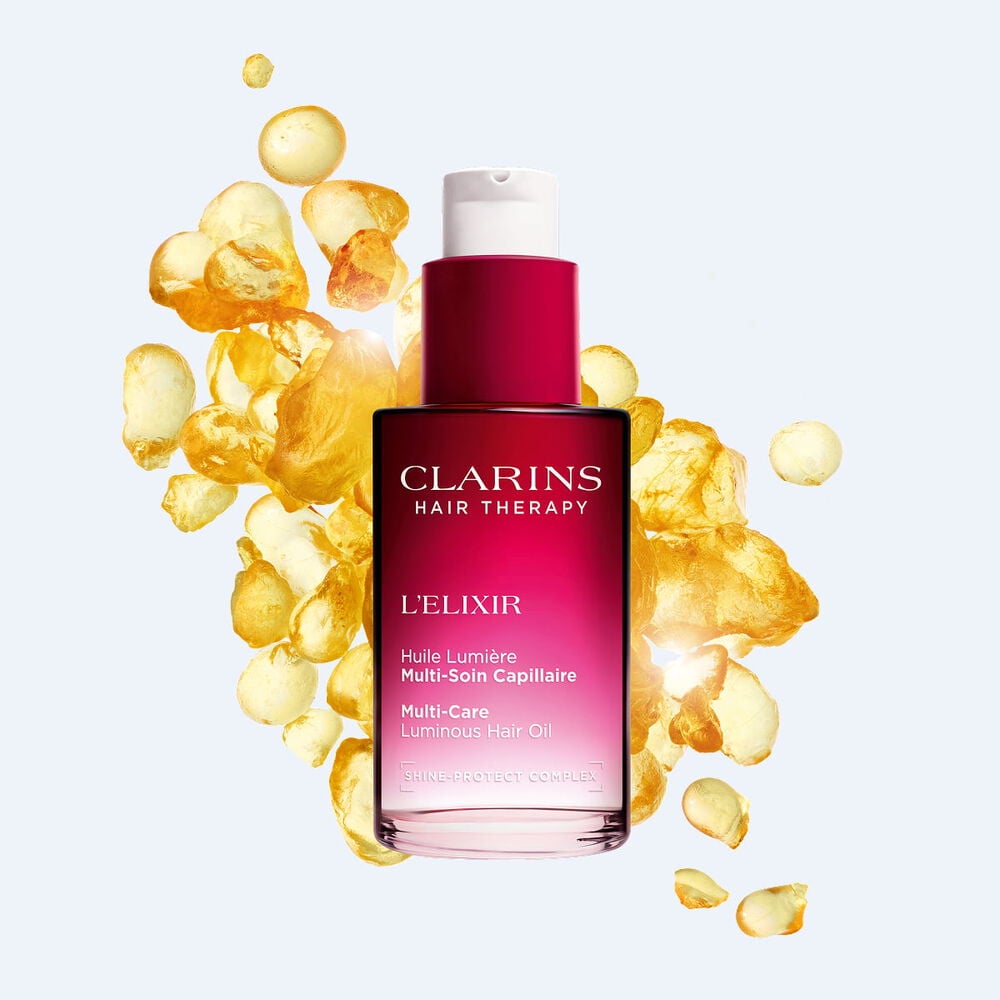 Flacon pompe de L’Elixir huile capillaire nourrissante Clarins